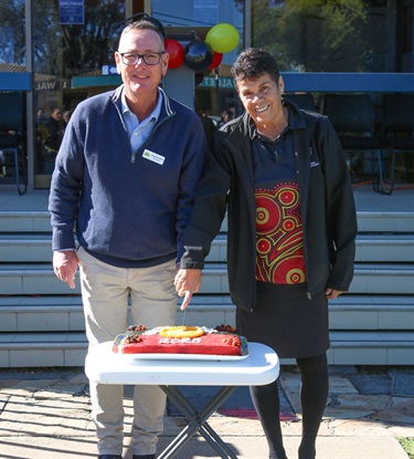 Deputy-Mayor-Rummery-and-Anne-Dennis-cutting-the-NAIDOC-Cake-2025.jpg